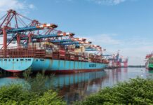 산업부·관세청, 전략물자 불법수출 단속 강화 위해 협업 a large blue boat sitting next to a dock