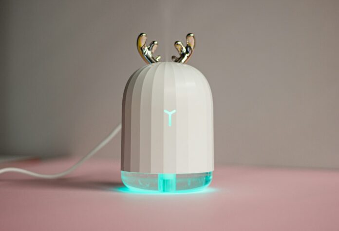 an electronic device with two birds on top of it