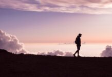 저녁 산책이 부르는 건강 혁명…일상에 더하는 활력 한 스푼 silhouette of person walking under white clouds